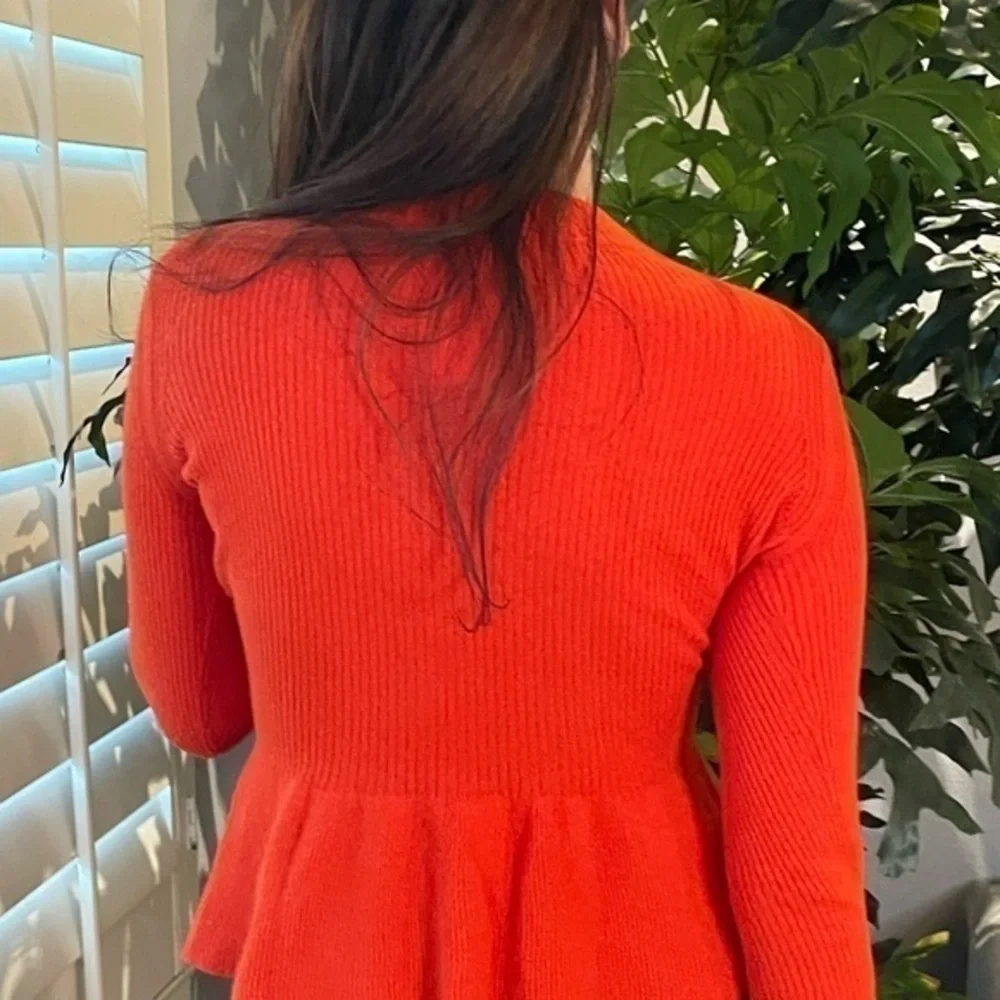 Peplum style Tory Burch sweater